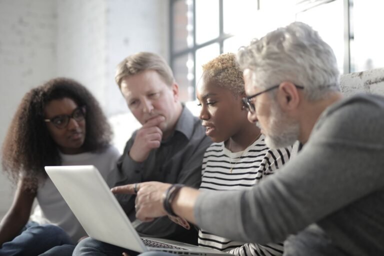 Hiring team comparing pre-employment assessment tools