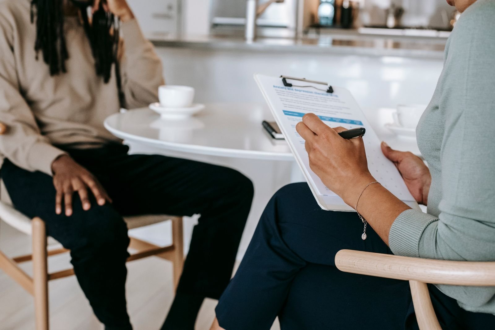 Interviewer and job seeker going through an interview