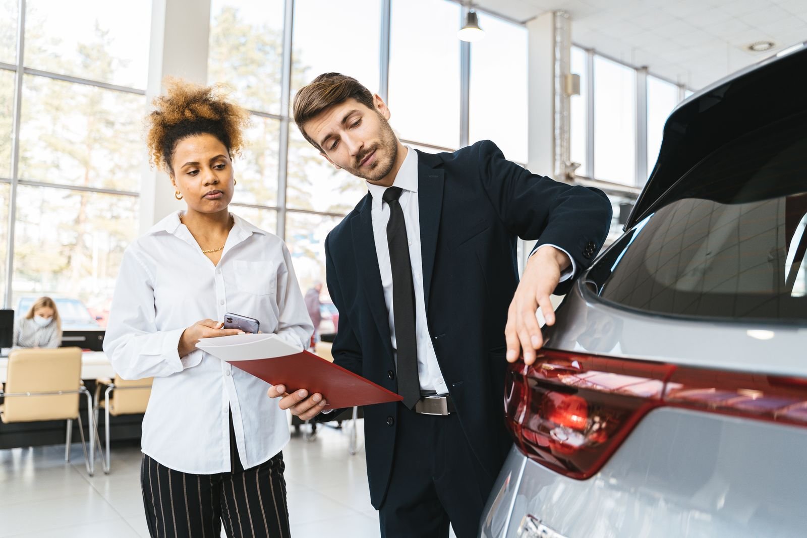 Salesman talking with a customer