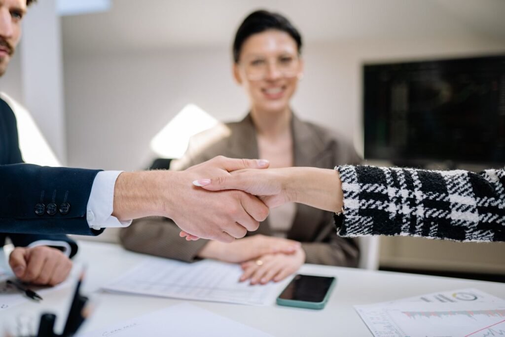 Hiring team discussing a sales candidate assessment